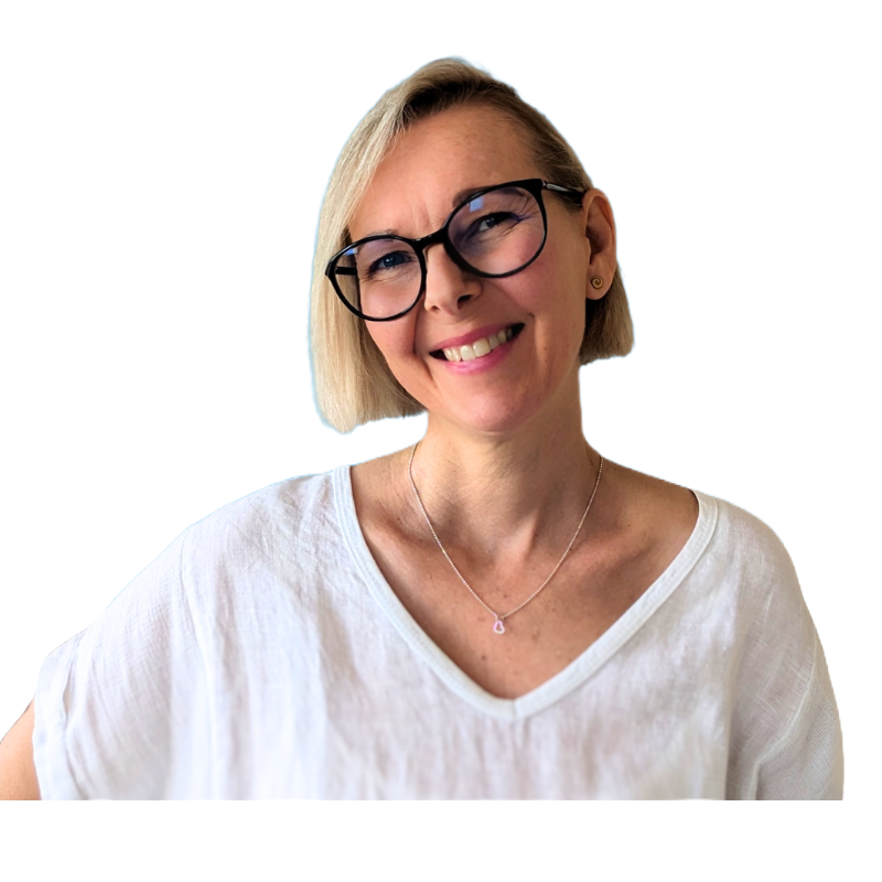 Disability Writer, Lia Stoll, a light-skinned woman with short blond hair is wearing dark-framed glasses, a white t-shirt.